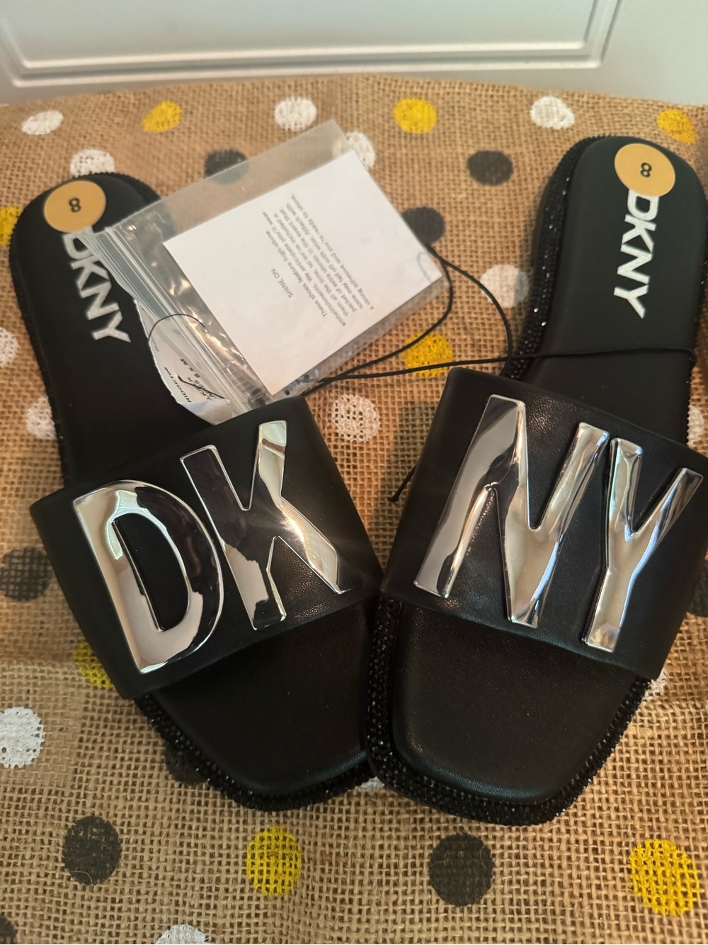 DKNY Black Slide Sandals with Silver Logo Plate - Picture 4 of 5